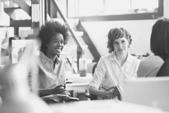 Employees working in a company with a diversity initiative